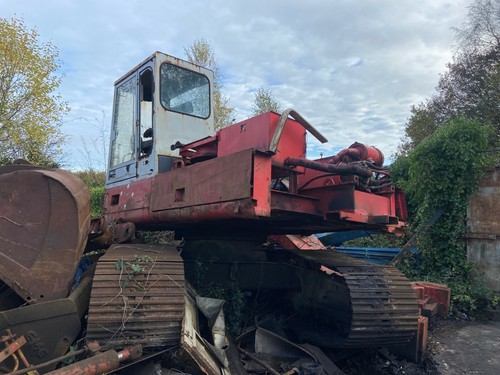 Poclain 125 excavator breaking