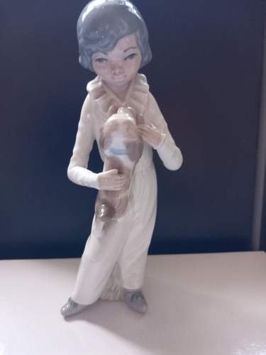 Casades young boy holding a - casades,