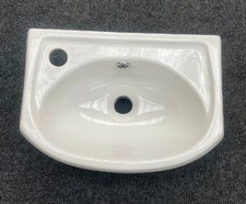 small cloakroom basin wall