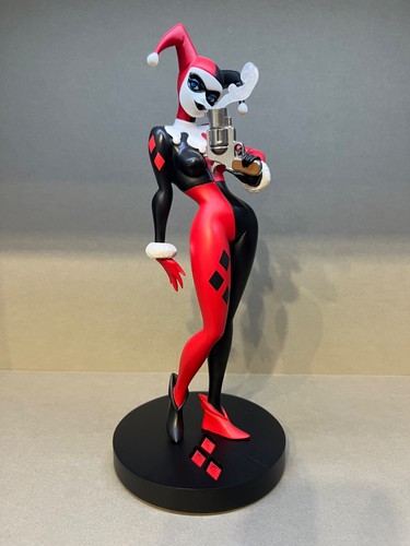 Harley quinn with - with, pistol,