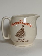 Old Famous Grouse Whiskey Water Jug. We have load Of Old Water Jugs!
