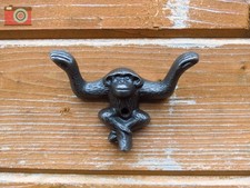 MONKEY THEME CAST IRON COAT &