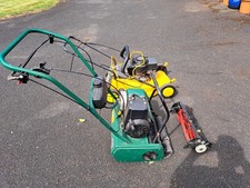 QUALCAST CLASSIC PETROL 35S AND YELLOW LAWN MOWER PETROL .