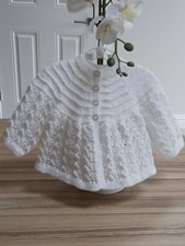 WHITE HAND KNITTED BABY