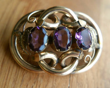 GORGEOUS, LARGE, ANTIQUE VICTORIAN, GOLD TONE KNOT BROOCH WITH AMETHYST PASTES