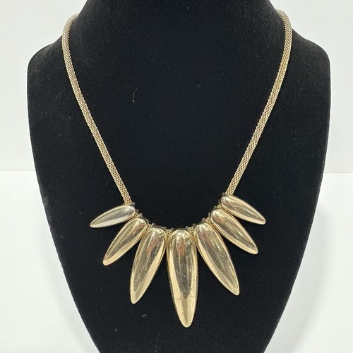 Gold tone mesh - tone, bib