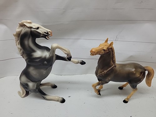 Hard plastic toy horses - hard,