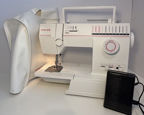 Singer sewing machine model - machine,
