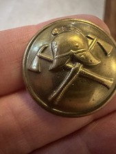 Vintage brass uniform button