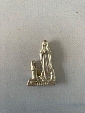 vintage metal figurine of the