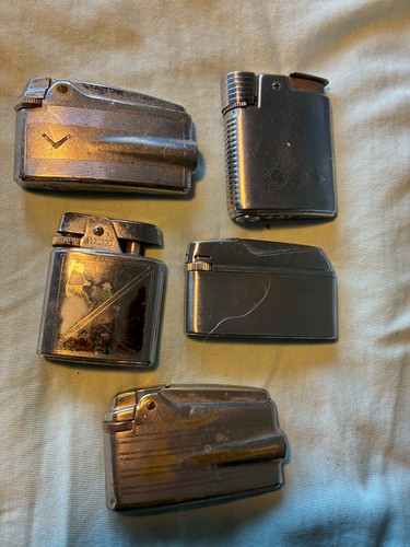 Old used cigarette lighters - old,