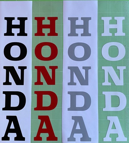 Two honda forks - honda, stickers