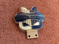 VINTAGE CAR BADGE.( Triumph