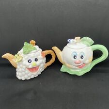 2x Charming,Novelty Crazy Fruit Character Miniature Teapots.