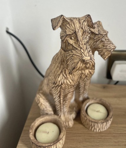 Two sitting airedale - two,