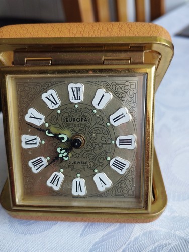 Antique travel alarm clock - , by