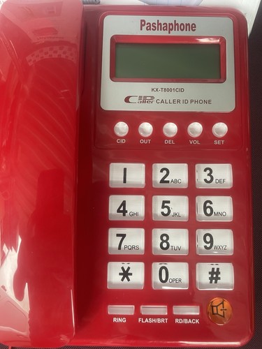 Bright red landline telephone - landline,