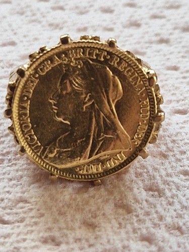 Beautiful half sovereign ring - half,