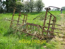 Photo 6x4 Old cultivator Lower Thorpe Old spring tine cultivator made by  c2008