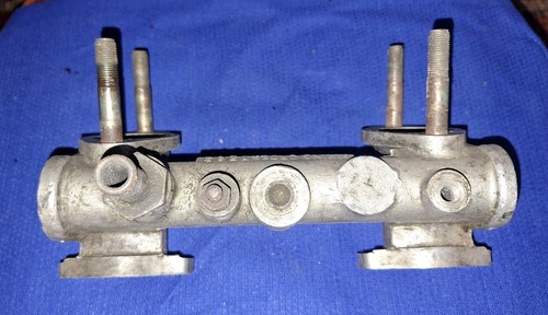 Twin carburettor manifold - carburettor,