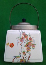 PARROTT & COMPANY LTD “CORONET WARE” LIDDED BISCUIT BARREL WITH HANDLE.