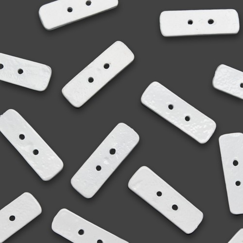 White oblong lead penny - white,