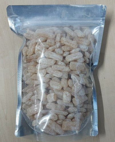 Gray herbal tablet sweets - sweets,