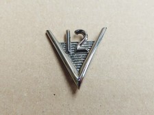 JAGUAR DAIMLER CENTRE CONSOLE "V12" BADGE FITS XJ12 SERIES 1 & 2 BD38514