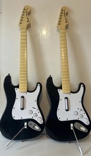 X 2 Wii Guitars Rockband