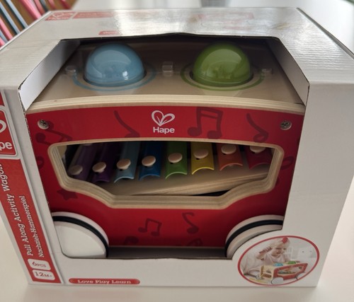 Hape pull along activity wagon - along,