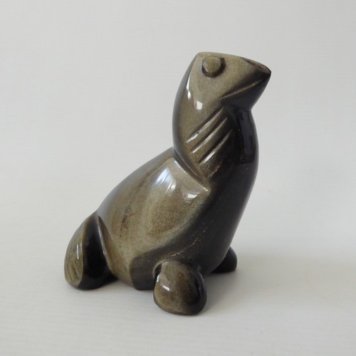 Stylised carved stone - , seal