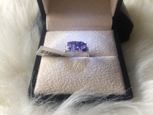 New white gold tanzanite - 9k,