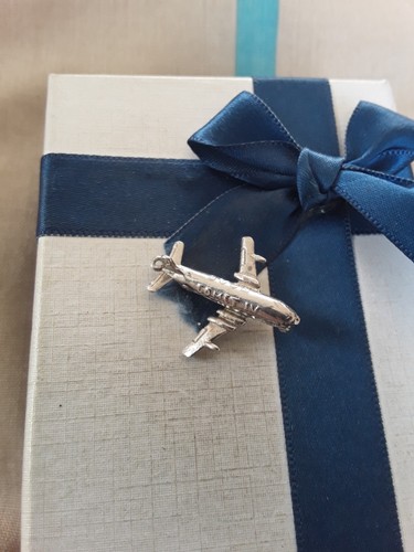 Silver charm plane opens - plane, to