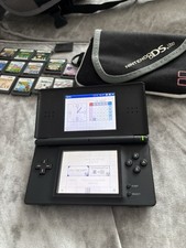Nintendo DS Lite Black plus games and cases 