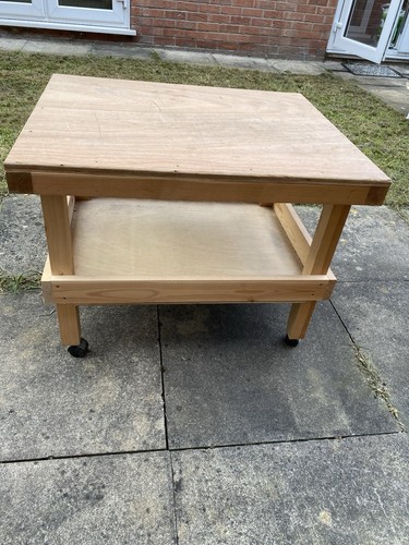 Wooden workbench wheels - on,