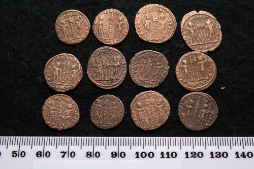 Roman coin showing soldiers - showing,