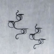 Pair of black steel wavy