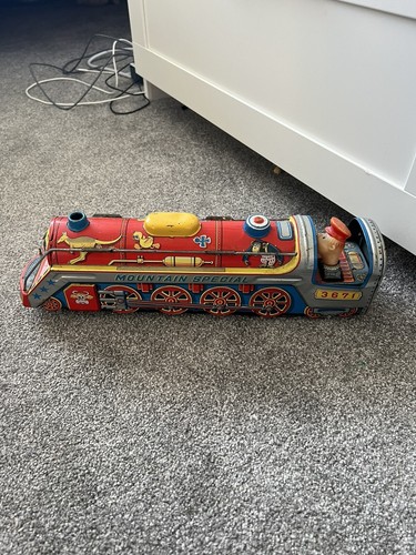 Vintage tin train mountain - train,