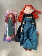 A Sealed Disney Store Merida Disney Princess Doll and a Merida Plush Doll