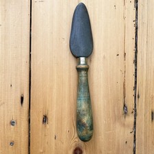 VINTAGE HANDLED CARBORUNDUM