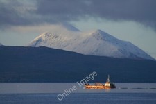 Photo 6x4 Wintry day off Scalpay Allt Liath Fishing boat off Scalpay, wit c2009