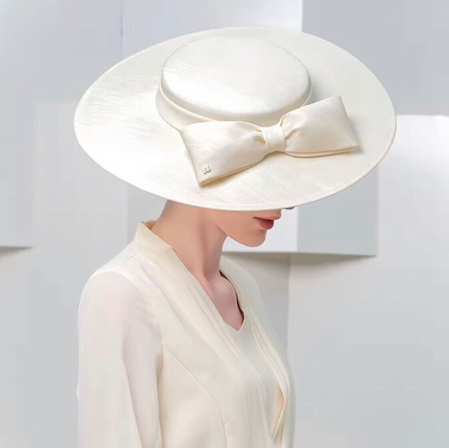 Ivory wide brim fascinator hat