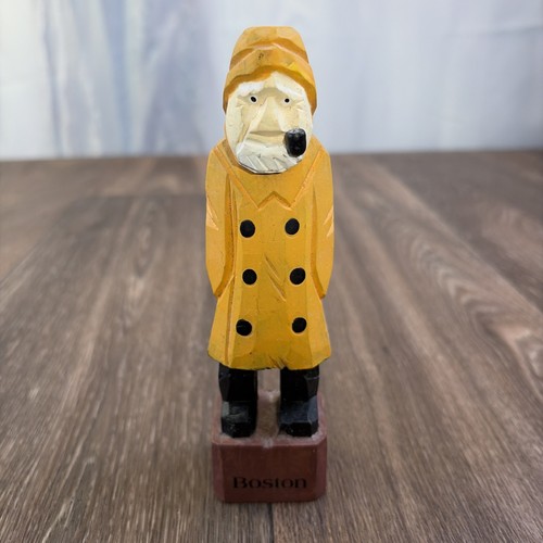 Hand carved wooden fisherman - hand,