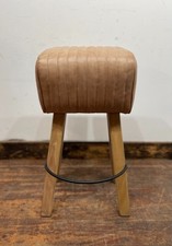 Pommel stool with light tan