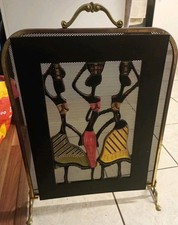 Vintage wooden/brass fire screen. Beautiful carved figures with brass over. 2ft