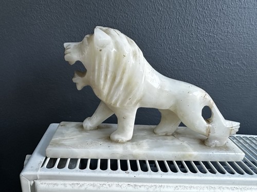 Carved stone lion - carved,