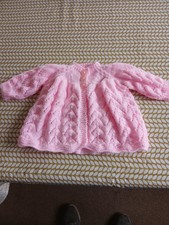 hand knitted matinee coat in