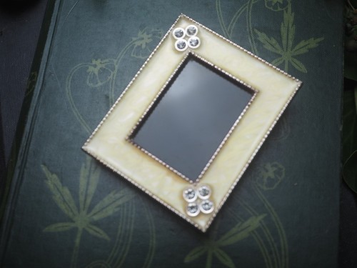 Enamel framed black - framed, scrying