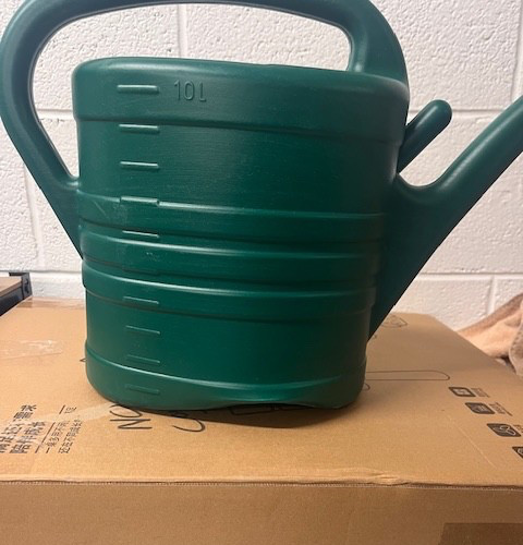 Wonky garden watering cans - wonky,