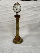 Mystery Swinging Swiss Clock